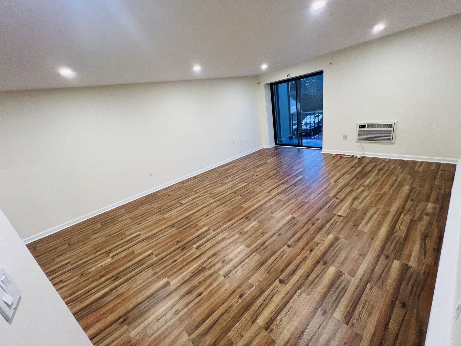 Finished basement bedroom with laminate flooring