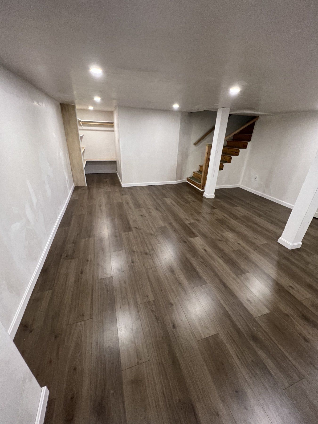 Finished basement with vinyl plank floor and recessed lights, Marlborough, MA