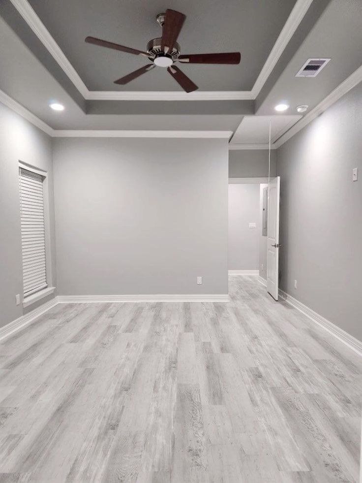 Freshly painted bedroom with tray ceiling